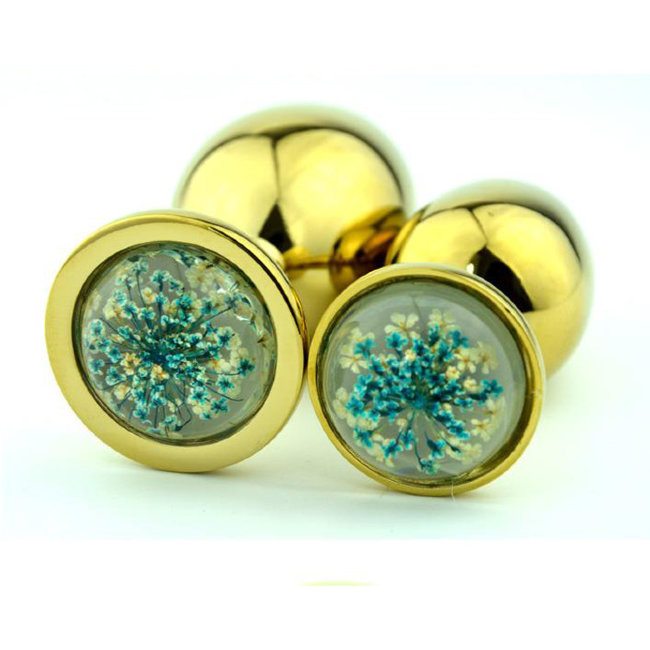 Золотая пробка с зелеными цветами